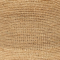 Crochet raffia, close up - palm fibre worked in loops that give and recover, the raffia that packs