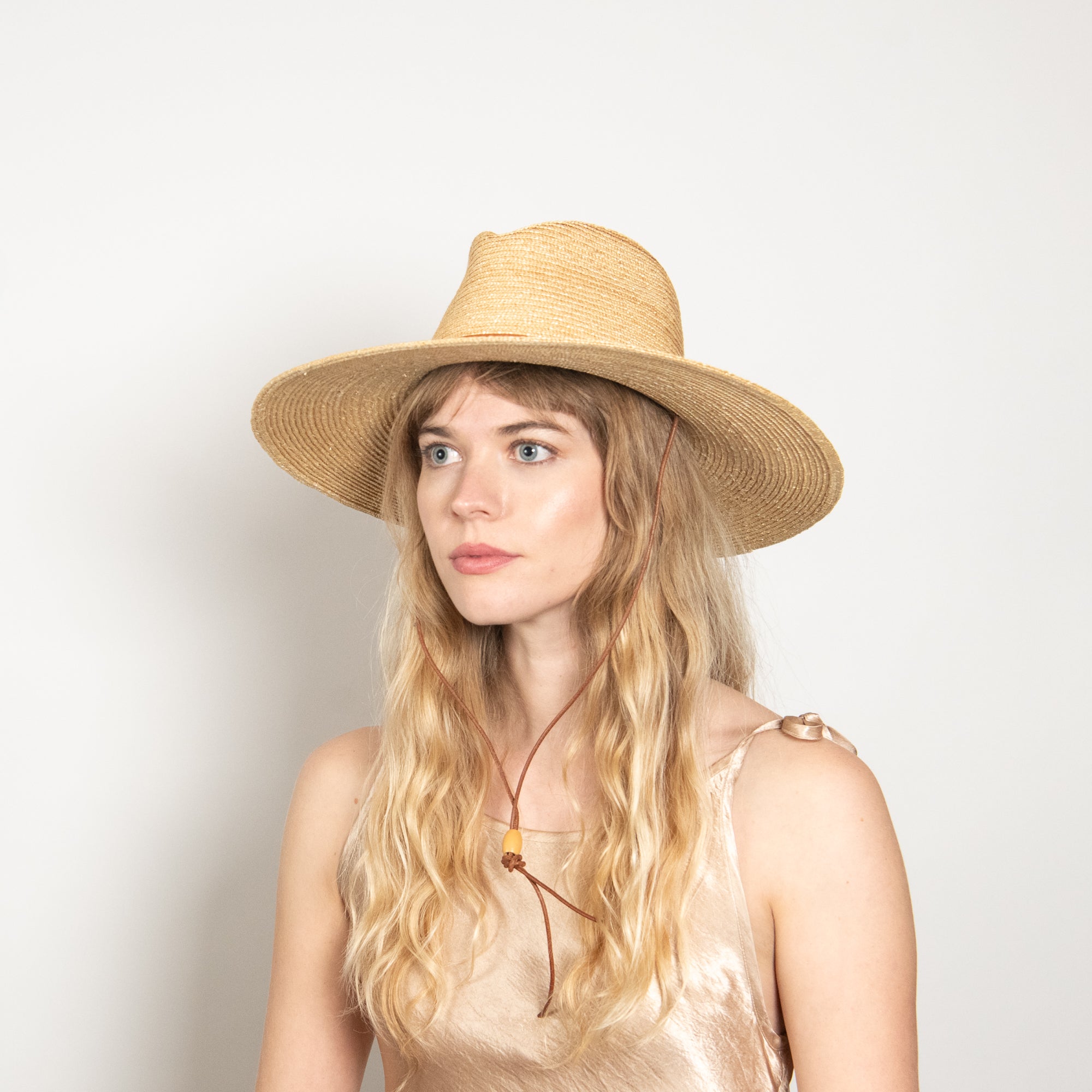 Straw Wide-Brim Sun Hat - Natural Wide-Brim Natural Straw Hat with Leather Ribbon | Eleventy main image 4